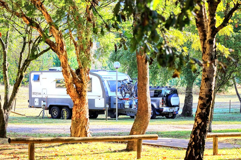 02-bright-valley-holiday-park-powered-site Bright Porepunkah Holiday Park, Powered caravan and camping site at Bright Valley Holiday Park in Porepunkah, Grassy Area, Plenty of Shade